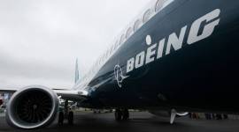Boeing cuts 12,000 jobs, resumes production of grounded jet