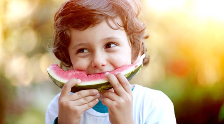 child eating healthy food, kid eating fruits, eat healthy, cooking shows, healthy food research study, indian express healthy food.