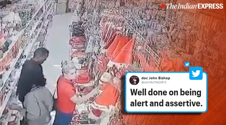 man steals phone from woman, woman catches man stealing phone viral video, 