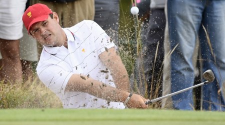 USA's Patrick Reed hits out of a bunker during a practice session ahead of the President's Cup Golf tournament in Melbourne, Tuesday, Dec. 10, 2019. (AP Photo/Andy Brownbill)
