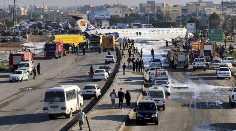 Iranian passenger plane slides off runway into highway passengers safe