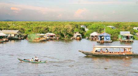 Cambodia Tonle Sap lake, Vietnamese living, Cambodia, Kampong Phluk, Siem Reap, indian express news