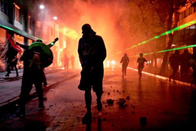 chile riots, chile protest, chile protest photos, chile unrest, chile president Sebastián Piñera, world news, indian express