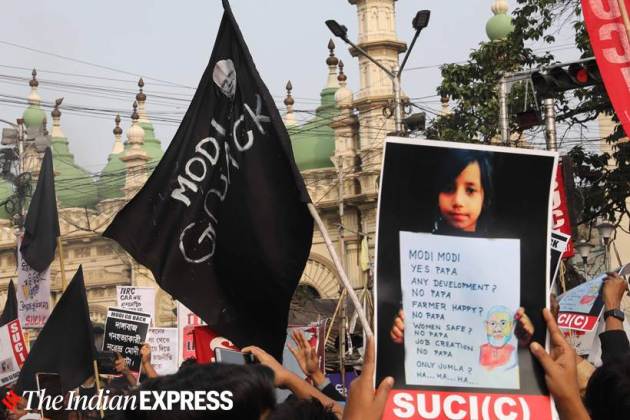 Modi Kolkata Photos, Kolkata Modi photos, Modi Mamamta Banerjee photos, Mamata Banerjee Kolkata Modi, Modi CAA protest, Go back Modi photos, Modi go back pictures, indian express photos