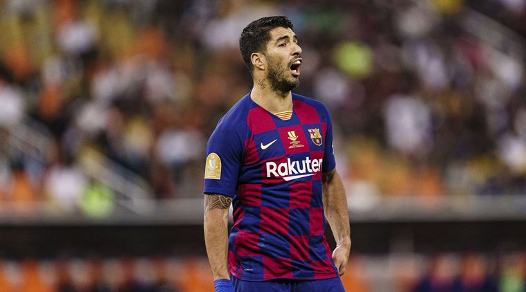 Luis suarez out for four months after knee surgery