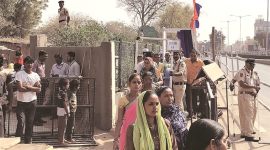 Slum wall Ahmedabad Saraniyavaas slum wall, Donald trump, narendra modi, Ahmedabad gujarat news, indian express news