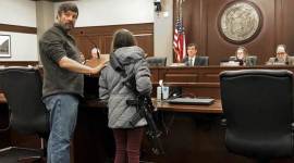 Girl carrying AR-15 assault rifle in Idaho legislative hearing