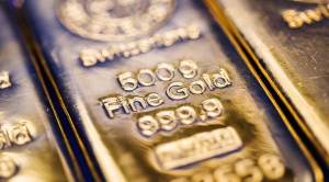 Gold eases as equities rally, Hong Kong woes limit losses