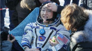 christina koch returns to earth, nasa astronaut christina koch, christina koch, koch returns to Earth, longest spaceflight by woman astronaut, nasa astronaut record breaking spaceflight