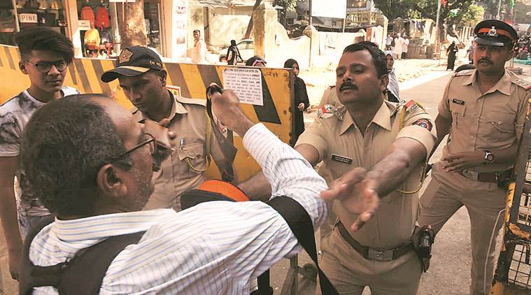 Mumbai photojournalist manhandled, photojournalist Ashish Raje, photojournalist Ashish Raje manhandled, mumbai cops transferred after photojournalist Ashish Raje manhandled, mumbai anti caa protests, mumbai bagh protests, mumbai city news