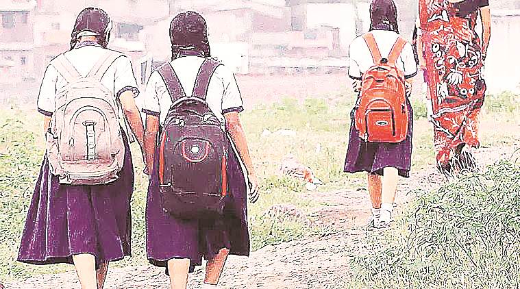 Ballia school children pull handcart viral video, Ballia school children carry grain sacks viral video, UP news, UP mid day meals