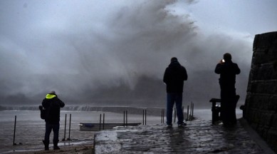 The Met Office had 68 flood warnings in place around England, 40 had been issued in Scotland and 10 in Wales by their environmental agencies. (Photo by Finnbarr Webster/Getty Images/file)
