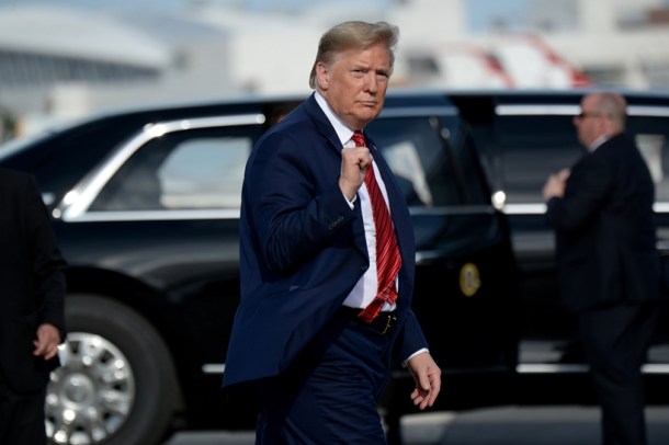 U.S. President Donald Trump walks to Air Force One after the NASCAR Daytona 500 in Daytona Beach