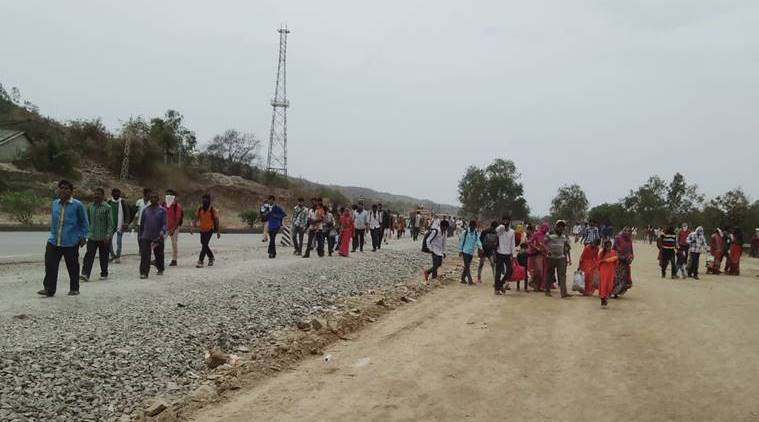 After migrant workers start on foot for home, Rajkot admn deploys 50 buses to ferry them