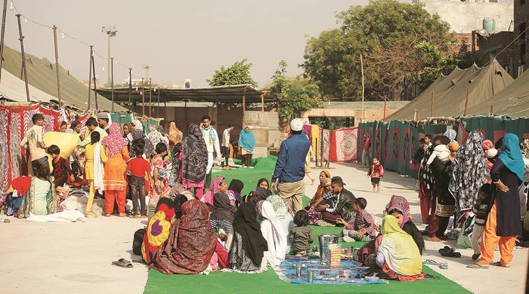 Delhi: Riot-hit families line up outside Eidgah in Mustafabad, now a relief centre