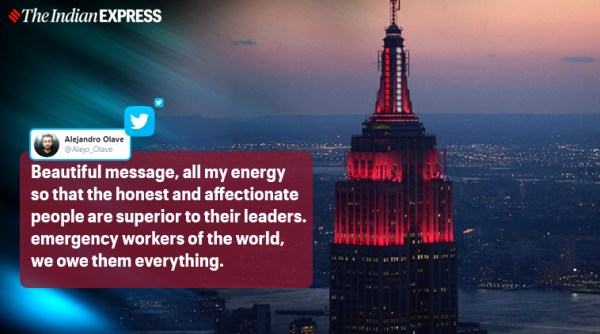 Empire State Building, Empire State Building lit in red Empire State Building coronavirus tribute, New York City coronavirus, Coronavirus, Covid-19, Trending news, Indian Express news