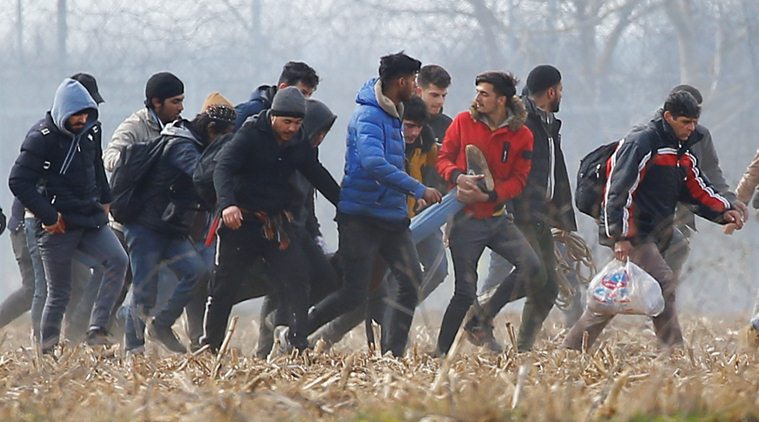 Greece migrant crisis, Greece Turkey border Migrants, Turkey Greece migrants clash, clashes between greece and Turkey migrants, World news Indian Expresss