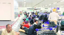 Passengers wait for over 8 hours before being taken to quarantine: IGI airport swamped as 11,000 land within hours