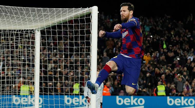 Lionel Messi's late goal puts Barcelona back on top in Spain