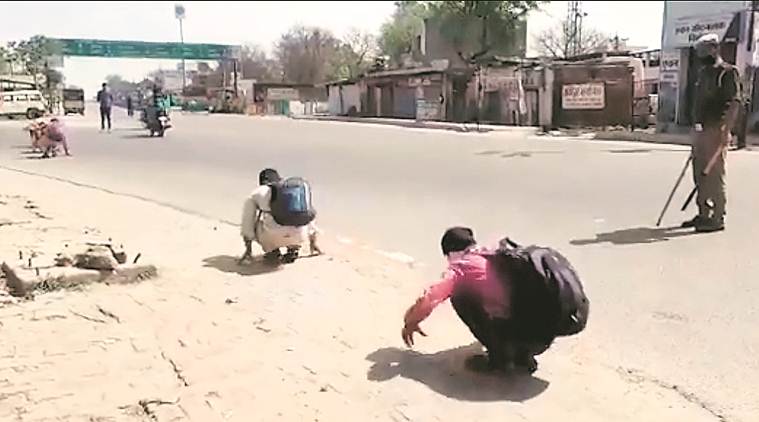 coronavirus, Coronavirus India Lockdown, covid 19, novel coronavirus, covid 19 india, UP constable suspended, UP constable labourers squat video, 