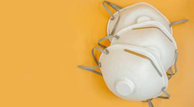 Coronavirus can stay on face masks for over a week, new study shows