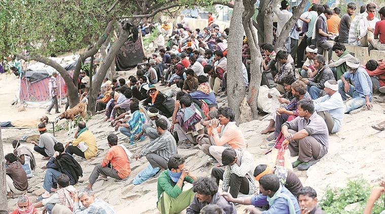 Scenes from outside a shelter: ‘This is what we people have been reduced to — fighting for food’