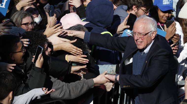 Despite coronavirus risk, 2020 hopefuls keep up campaigns for now