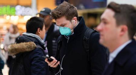 Coronavirus can stay on face masks for over a week, new study shows