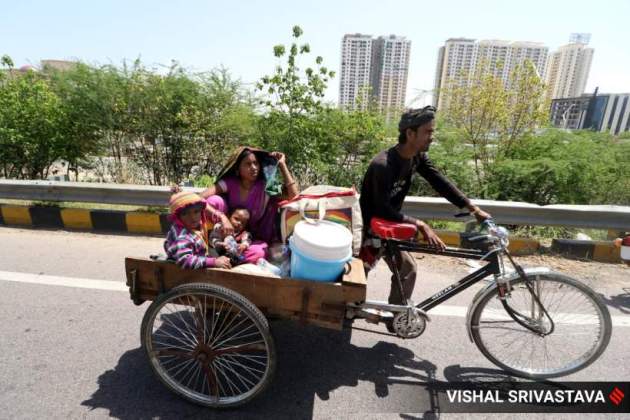 COVID-19: After long walk back home, migrant workers get food and ...
