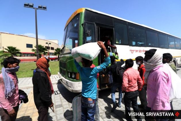 COVID-19: After long walk back home, migrant workers get food and ...