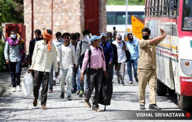 COVID-19: After long walk back home, migrant workers get food and ...