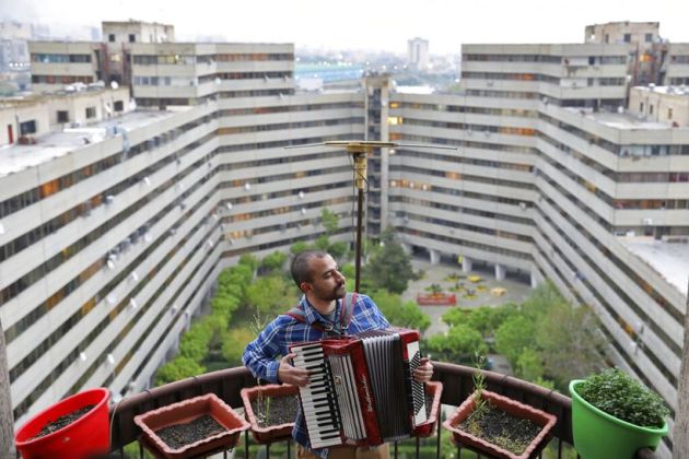Coronavirus lockdown Iran, coronavirus mandatory self isolation Iran, iran musicians perform rooftops coronavirus, iran musicians coronavirus, sel isoation coronavirus, quarantine coronavirus, what do do at home, work from home, stay at home, things to do while at home, skills while at home, new hobbies to learn at home, coronavirus news, coronavirus world news, coronavirus latest news,Iran coronavirus case, Iran coronavirus deaths, indian express news