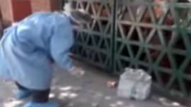 The Agra model? Wear PPE, throw food at people who have been locked up