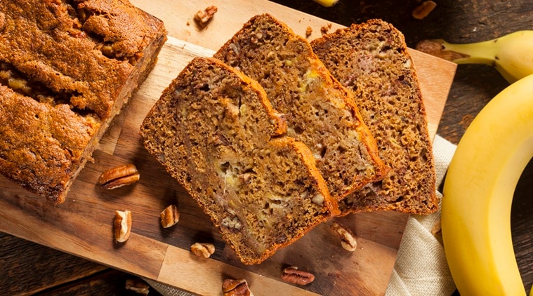 Premium Photo  Woman hand mashing up several bananas to bake into a banana  bread