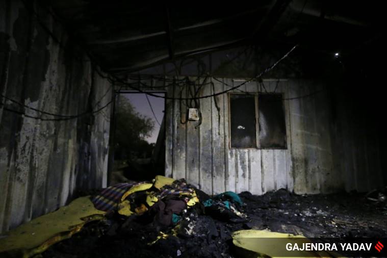 Fire at crowded Delhi shelters, residents held