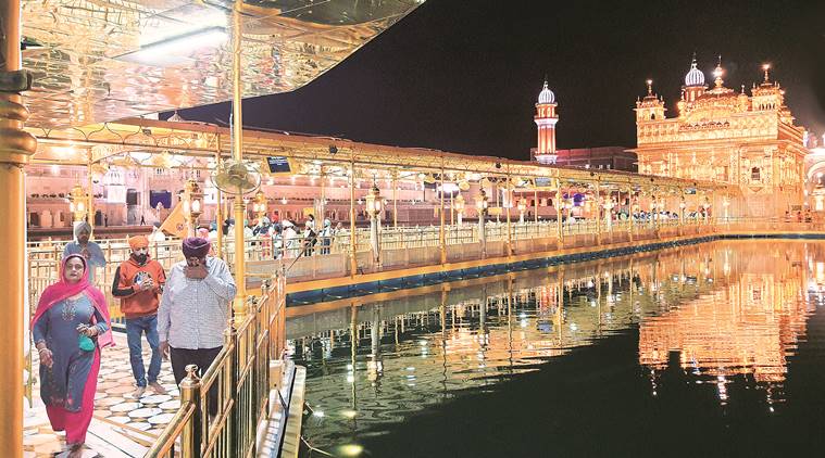 Devotees bypass barricades, sneak through bylanes to reach Golden Temple: Amritsar no stranger to curfew, but people still out and about