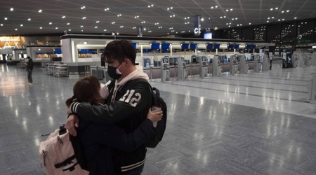 Instead of athletes and visitors for Olympics, Tokyo airport stands empty
