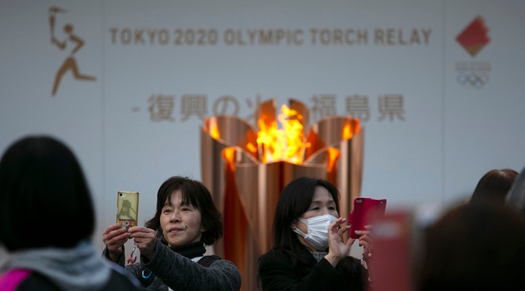 Tokyo Olympic flame taken off display; next stop unclear