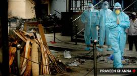 Coronavirus deaths, corvid patients funeral, Coronavirus patients last rites, Covid funeral photos, coronavirus India, Indian express photos, Delhi funeral photos, Funeral guidelines, Indian express