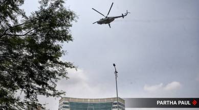 IAF chopper showers petals, IAF chopper showers petals on hospitals, showering petals, showering petals on hospitals, coronavirus fighters, COVID fighters, India news, Indian Express