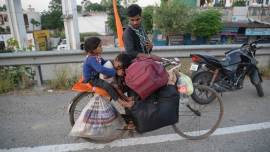 With migrants headed home, 65% hike in MNREGA funds