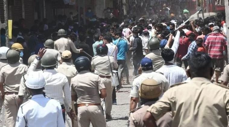 coronavirus, india lockdown, migrant workers, migrant workers in gujarat, migrant workers clash in surat, migrant workers clash with surat police, migrant workers trains, indian express news