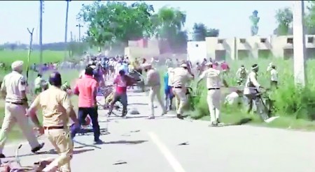 Haryana govt faces flak over video of police lathi-charging migrants