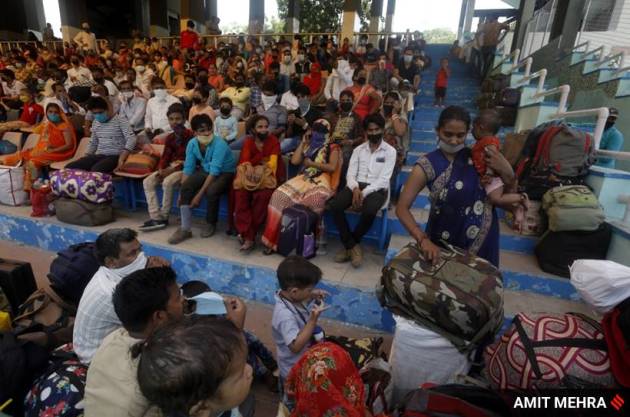 Migrant workers continue to leave Delhi – on foot and trains | India ...