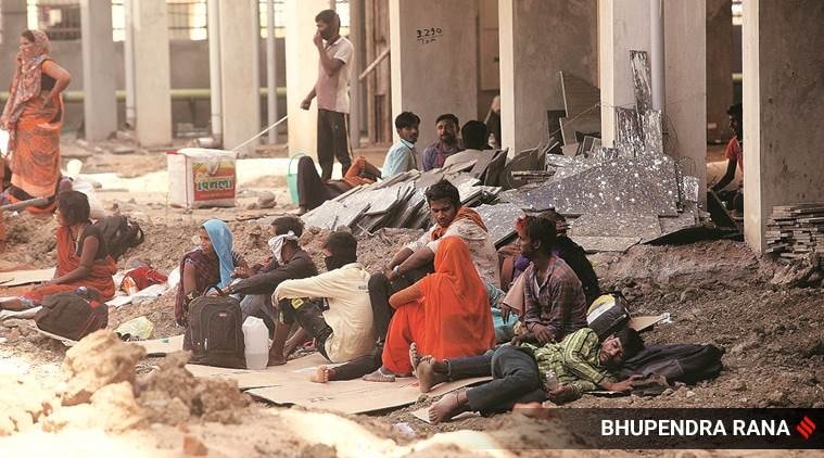 coronavirus, coronavirus outbreak, migrant workers, migrant workers screening, migrant worker trains, sharmik special trains, jalandhar flyover, indian express news