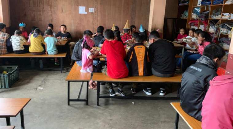monk, coronavirus, monk feeding children in sikkim, coronavirus care for underprivileged children, indian express, indian express news