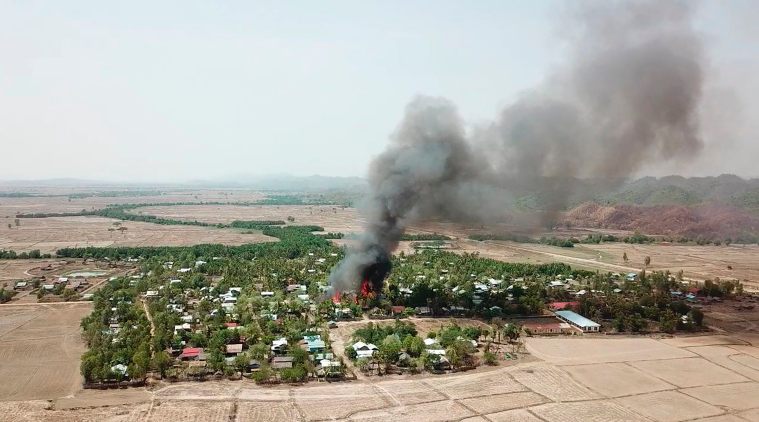 Rights group: Satellite images show Myanmar village burning