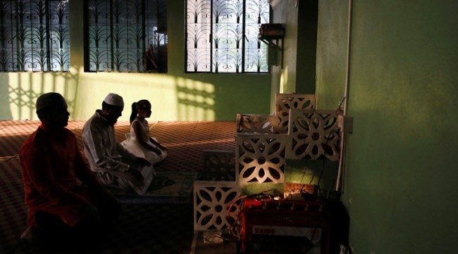 Muslims offer Eid al-Fitr prayers at an empty mosque during the lockdown imposed by the government amid concerns about the spread of coronavirus disease (COVID-19) outbreak, in Bhaktapur, Nepal May 25, 2020. REUTERS/Navesh Chitrakar