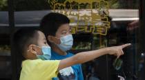 WHO chief warns virus pandemic 'accelerating'