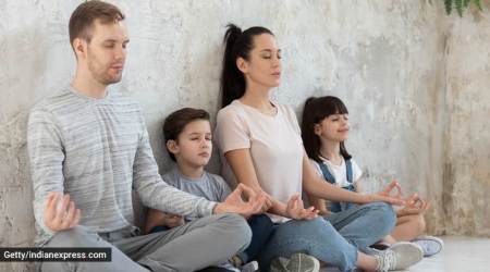 yoga for mental health and physical well-being, yoga asanas for the entire family, yoga for stress and anxiety, International Yoga Day, Ira Trivedi, indian express, indian express news